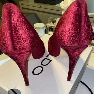 Wine-colored Aldo Stessy brand heels.